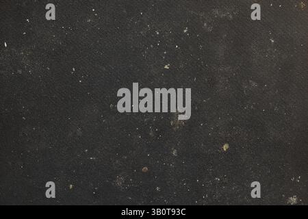 Black rubber mat with crumbs and dirt, top view, texture for background Stock Photo