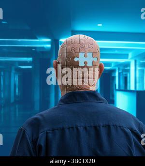 Elderly man with missing memory puzzle piece – concept of dementia, alzheimer’s, and memory loss Stock Photo