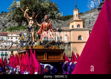 The Paso Oración en el Huerto de San Antón of the Venerable Hermandad de Nuestro Padre Jesús Orando en el Huerto (San Antón) shows Jesus praying in the Garden of Gethsemane, accompanied by an angel, and symbolises the beginning of the Passion of Christ at the Maundy Thursday procession in Cuenca. Calle San Lázaro, Cuenca, Castilla-La Mancha, Spain Stock Photo