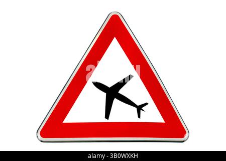 Road sign - Low-flying aircraft. Sign warning about air traffic over the road isolated on white with clipping path included Stock Photo