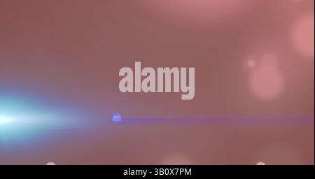 Image of glowing blue light over pink light spots Stock Photo