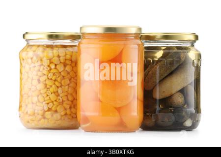 Many jars with different pickled products isolated on white Stock Photo