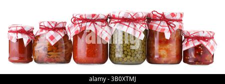 Many jars with different pickled products isolated on white Stock Photo