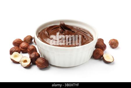 Chocolate hazelnut spread in bowl and nuts isolated on white Stock Photo