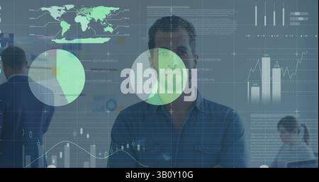 Statistical data processing against portrait of caucasian man smiling at office Stock Photo