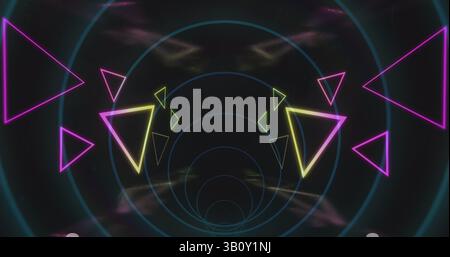 Image of tunnel with neon shapes over black background Stock Photo