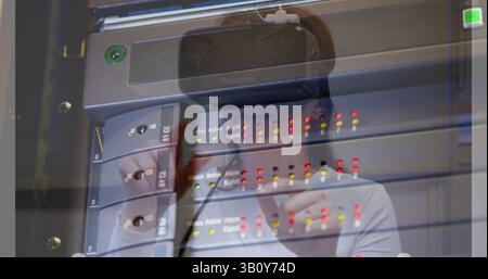 Image of server room over caucasian woman using vr headset Stock Photo