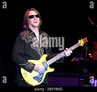 TAL MORRIS of Creedence Clearwater Revival plays the base guitar during a performance of Creedence Clearwater Revisited Saturday, Sept. 11, 2010 in Las Vegas, NV. (Credit Image: © Barry Sweet/ZUMApress.com) Stock Photo