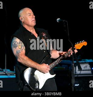 JOHN TRISTAO, lead singer of Creedence Clearwater Revival plays the base guitar during a performance of Creedence Clearwater Revisited Saturday, Sept. 11, 2010 in Las Vegas, NV. (Credit Image: © Barry Sweet/ZUMApress.com) Stock Photo