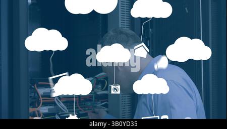 Image of media icons over caucasian male worker inspecting server room Stock Photo