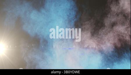 Image of light spots and smoke trails on black background Stock Photo