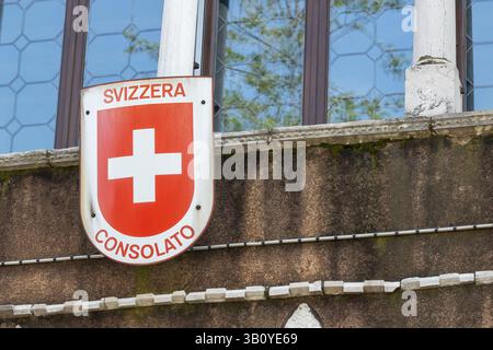 Venice, Italy - April 17 2025: Swiss Consulate sign on historic building with window reflections in Venice Stock Photo