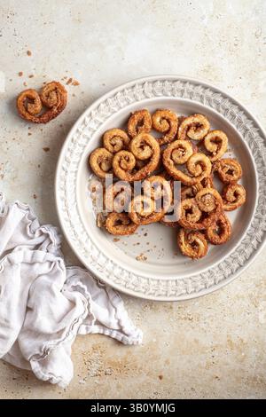 Cinnamon sugar palmiers on a plate Stock Photo