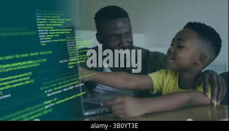 Image of data processing over happy african american father and son using laptop Stock Photo