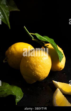 Fresh whole lemons with leaves Stock Photo
