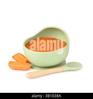 Baby food. Tasty puree in bowl, carrot and spoon isolated on white Stock Photo