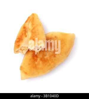 Whole and bitten fried pyrizhky (stuffed pies) isolated on white Stock Photo
