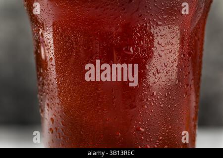 Boozy Refreshing Cold Red Ale Craft Beer in a Pint Glass Stock Photo