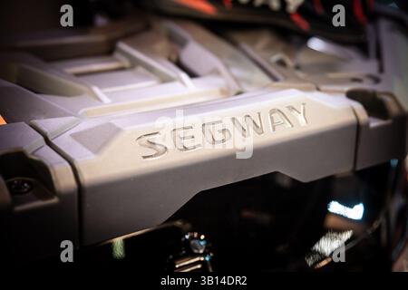 BELGRADE, SERBIA - MARCH 21, 2025: Close‑up of a SEGWAY logo lettering on a rugged grey plastic panel of a new personal‑mobility vehicle. Segway is an Stock Photo