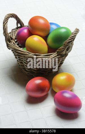 Colourful Easter eggs in baskets, Easter, Easter egg hunt Stock Photo
