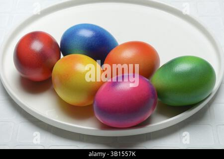Coloured eggs on plate, Easter, Easter festival Stock Photo