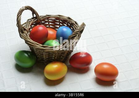 Colourful Easter eggs in baskets, Easter, Easter egg hunt Stock Photo