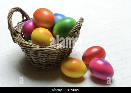 Colourful Easter eggs in baskets, Easter, Easter egg hunt Stock Photo