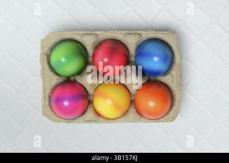 Colourful Easter eggs in packaging, dyed eggs Stock Photo