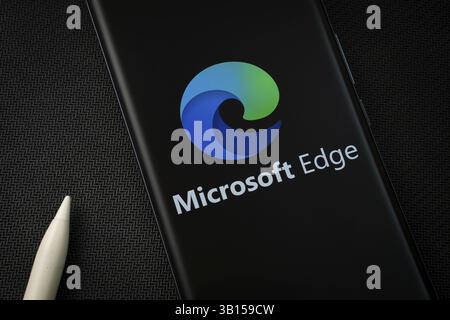 Dhaka, Bangladesh - 17 March 2025: The logo of the microsoft edge is displayed on a smartphone screen Stock Photo