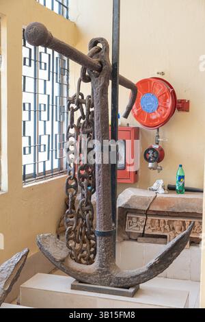 An old ship anchor on display at the Odisha state museum. Stock Photo
