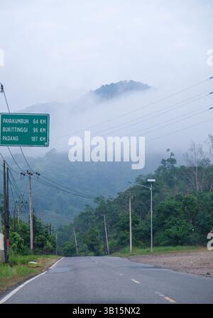 Distance signs on highways to cities in West Sumatra Stock Photo