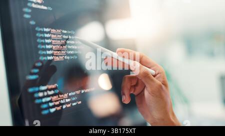 Programmer, hands or person with screen for code, app development and debugging computer. Closeup, programming and employee with technology review for Stock Photo