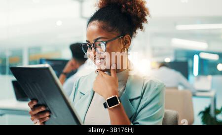 Coding, thinking and woman on tablet in office for problem solving, web development and insight. Idea, happy programmer and technology for software Stock Photo