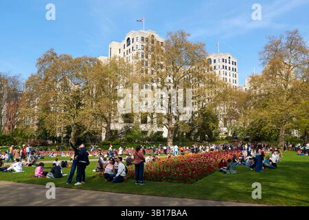 Victoria Embankment Gardens, London UK, in springtime, with crowds Stock Photo