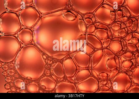 Red and Orange Macro Shot of Soap Bubble Texture Stock Photo