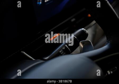 Close up view of car light switch control. Headlight switch, turn signal lever, and fog light switch Stock Photo