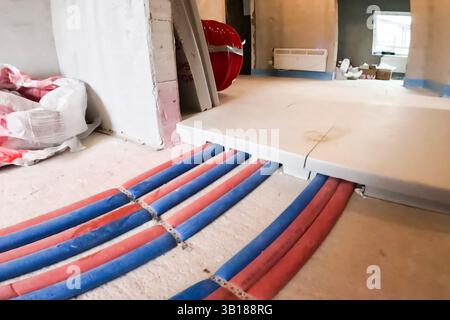 Astana, Kazakhstan 23 May 2024 - Underfloor heating system. Installation of underfloor heating. Pipes for wiring the heating system, underfloor heatin Stock Photo