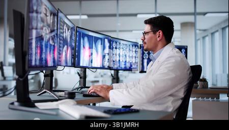 Radiologist Dentist Using X Ray Software On Desktop Computer Stock Photo