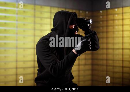 Vault Bank Robbery By Thief In Mask Stock Photo