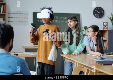 Experiencing Virtual Reality in Classroom Setting Stock Photo