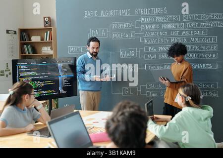 Teaching Algorithmic Structures in Classroom Setting Stock Photo