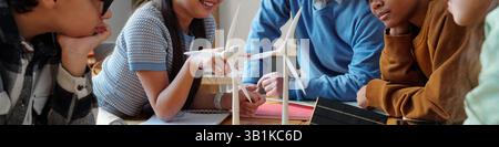 Students Collaborating on a Science Project in Classroom Stock Photo