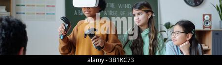 Experiencing Virtual Reality in Classroom Environment Stock Photo