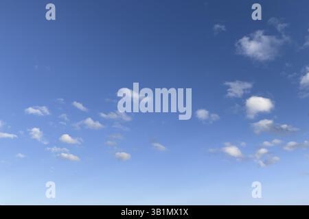 Small white cumulus clouds Cirrocumulus under blue sky, international Stock Photo