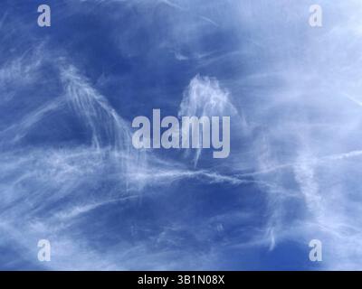 Fibrous feather clouds Veil clouds Cirrus under blue sky, international Stock Photo