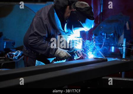Welder working in mechanical industry, Basque country, Spain. Stock Photo