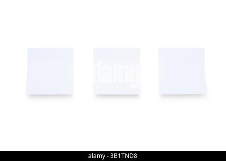 White sticky note stickers stuck on white background Stock Photo