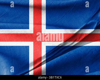 The image features the vibrant flag of Iceland, with its distinctive red, white, and blue design, gracefully folded to reveal a textured fabric surfac Stock Photo