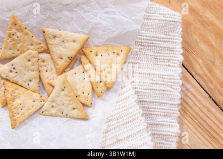 triangular crackers, dietary cereal with seeds Stock Photo