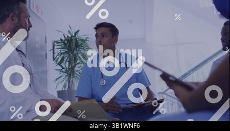 Image of percent data processing over diverse doctors using tablets Stock Photo
